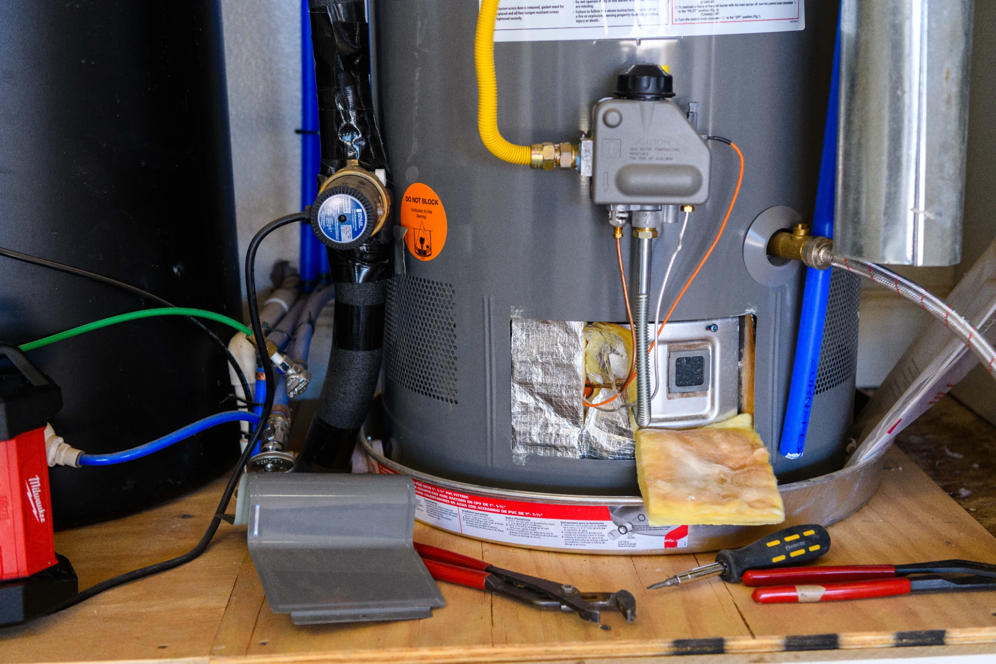 Big Pro AC Repair technician checking an air conditioning system in Berthoud, CO